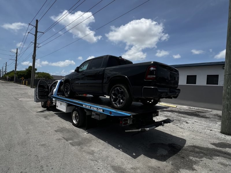 Our tow truck picking up a client's car